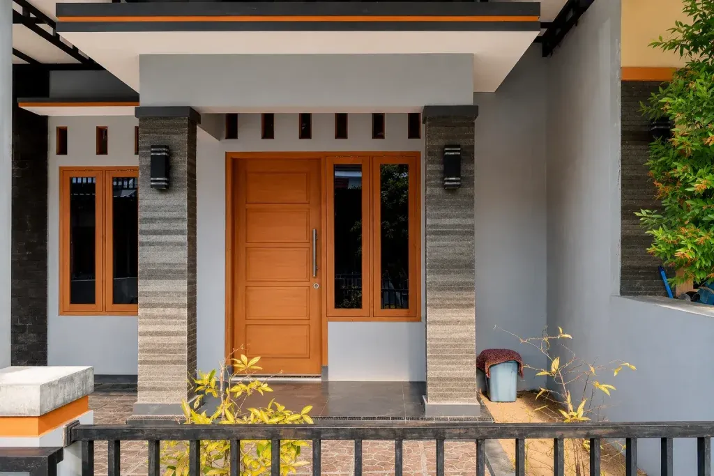 modern-house-entrance-design-wooden-door-stone-cladding.webp